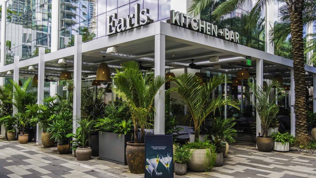 Earls Kitchen + Bar covered outdoor dining area corner at Miami Worldcenter