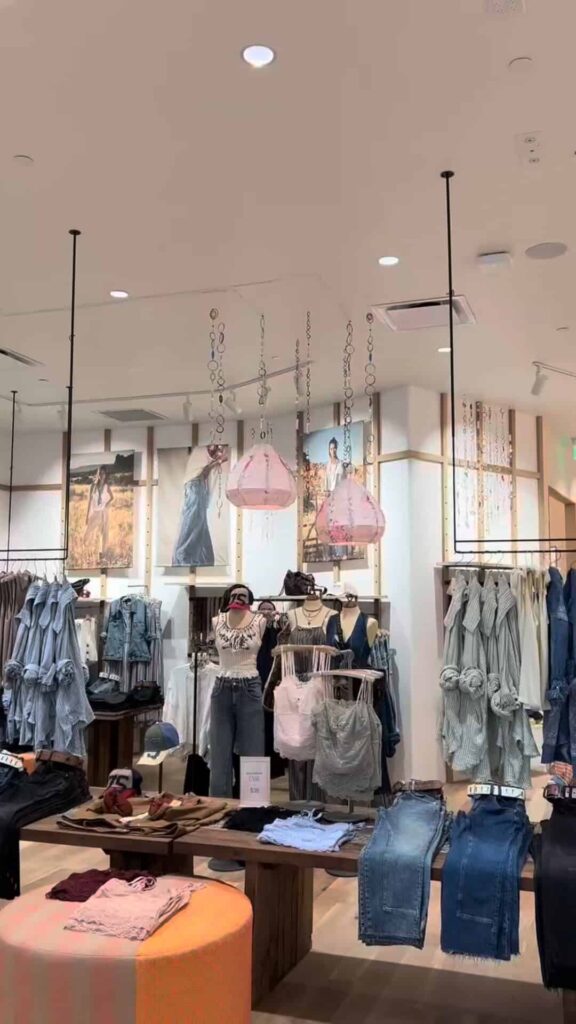 Free People Miami Worldcenter in-store clothing tables and displays