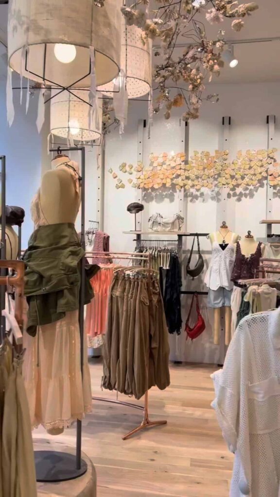 Women’s clothing and accessories on display inside Free People Miami Worldcenter