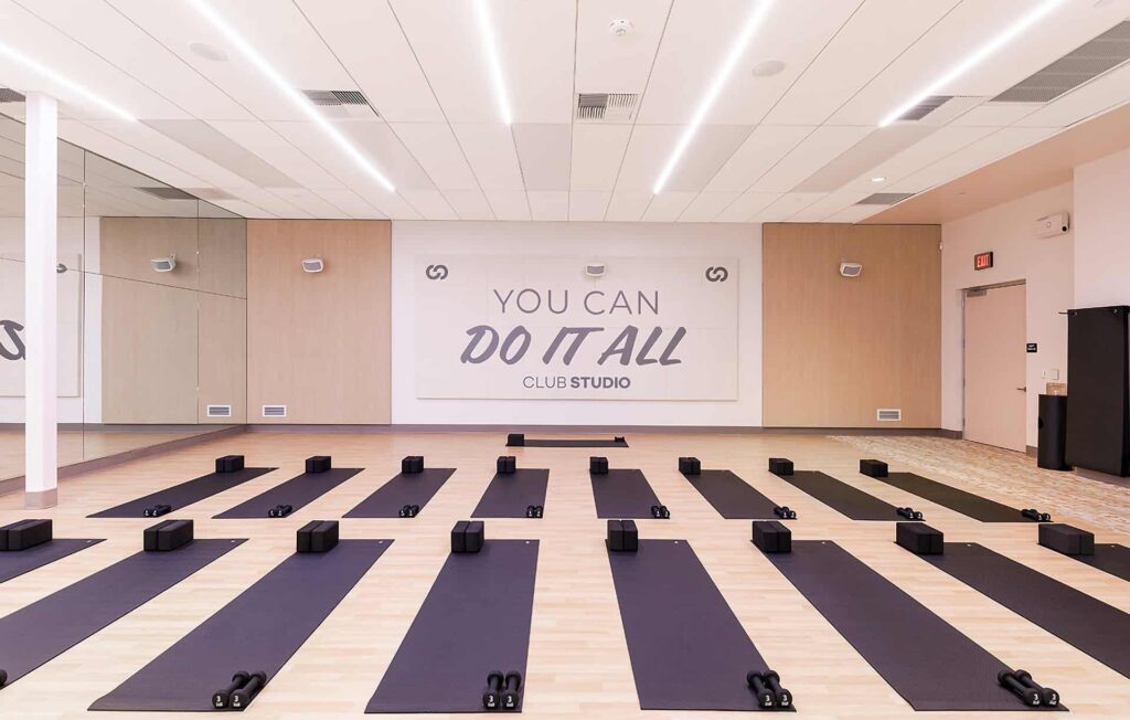 Rows of gym mats at a Club Studio Fitness Center