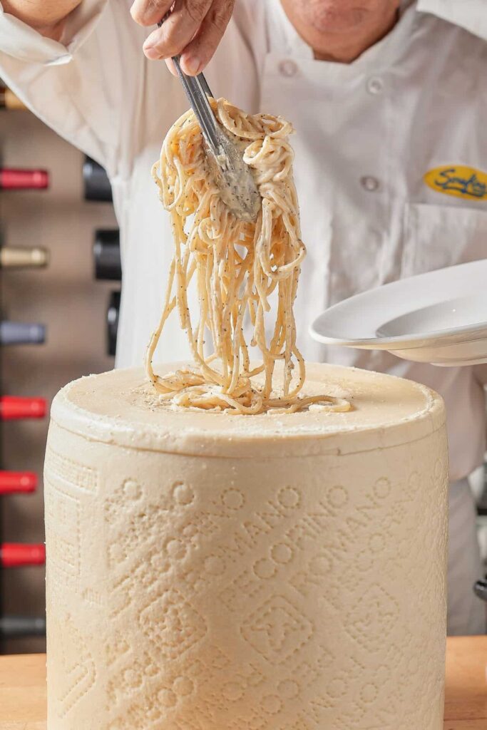 Chef at Serafina Miami preparing a signature Cacio E Pepe pasta dish