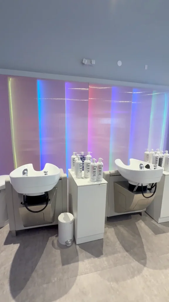 Sinks and hair care products at Blo Blow Dry Bar