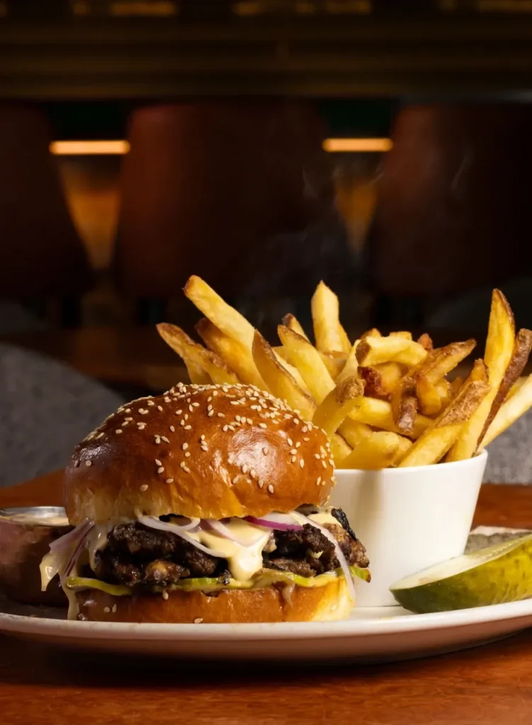 Wagyu burger and fries at Eight Bar
