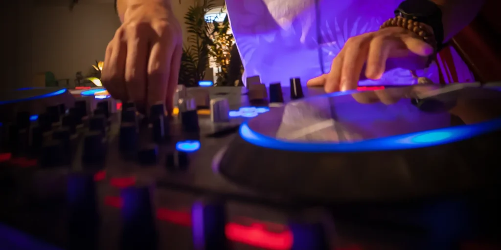 Live DJ performing with a turntable