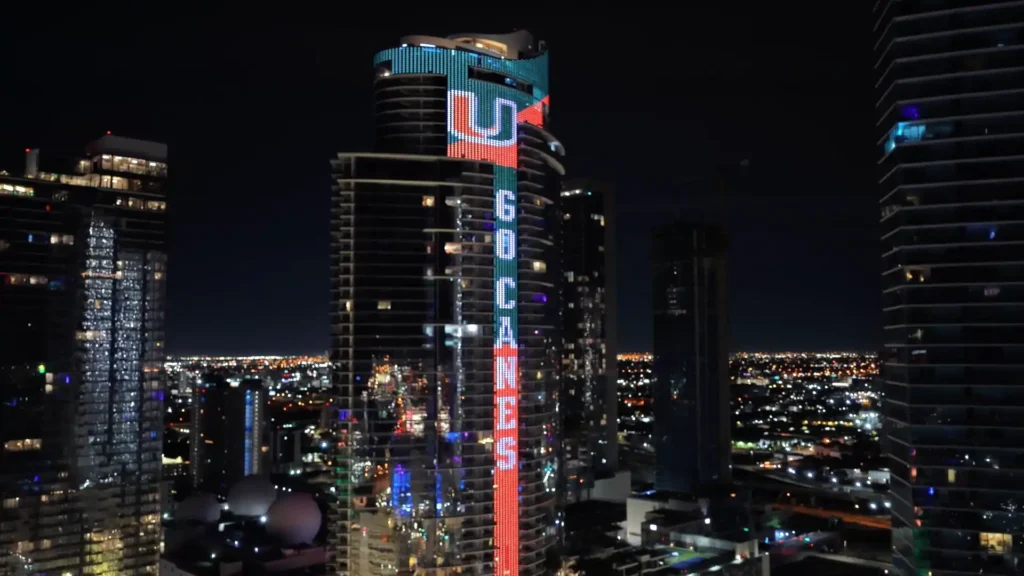 Paramount Miami Worldcenter Tower displaying a “Go Canes” banner in support of the Miami Hurricanes ahead of the 2026 College Football Playoff Championship